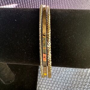 Bangle Bracelet Trio. Goldtone, smooth high polish and textured.